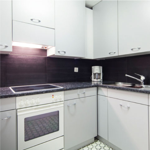 Kitchenette with refrigerator
